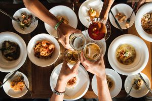 Be a frugal foodie by hosting dinner parties.