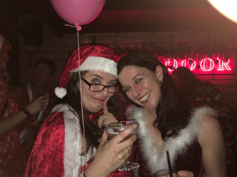 Manchester socialising Santa pub crawl